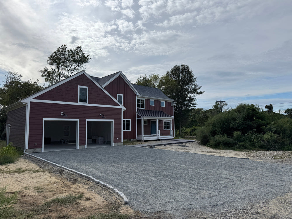 Garage Entrance - Reinforced Gravel Parking Addition to Residential Driveway